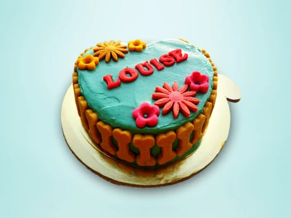 Floral bone-shaped cake with turquoise icing and colorful flowers